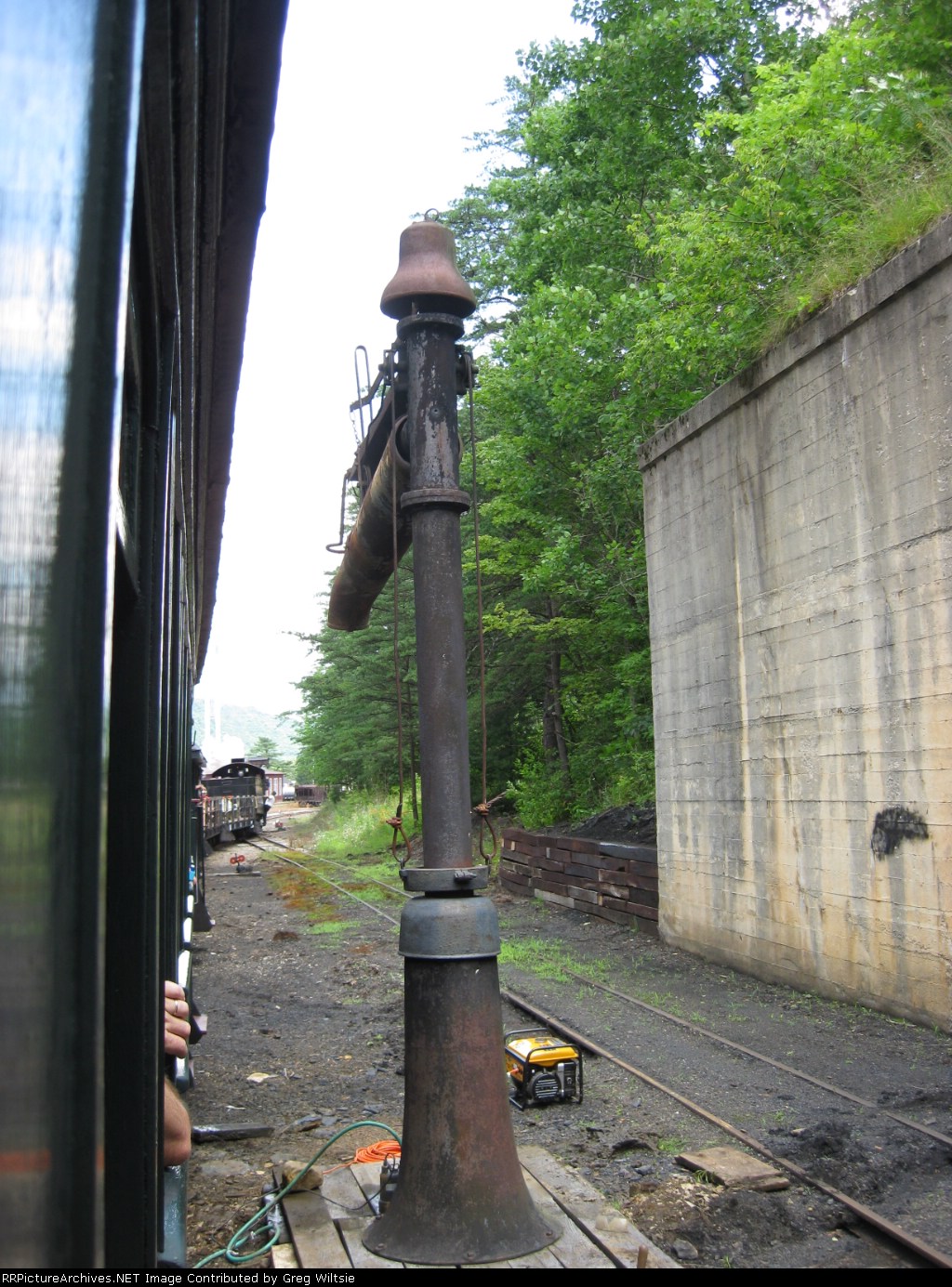 Spout to fill engines with water