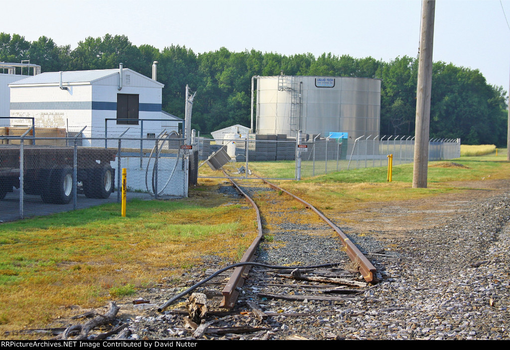 Abandoned track on company's property