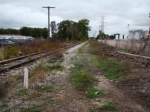 Looking North, this is "Fitch" once a crossing with the Toledo and Western inturban. The TT serviced several industries here at one time. Notice the NB main is gone and a siding at.one time too. NB main was intact untill 1988 or so.