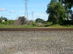 Looking NB from Nasby..the former Conrail tracks are straight lined now where once diamonds ran across the CR. The road bed for the main is across the CR tracks