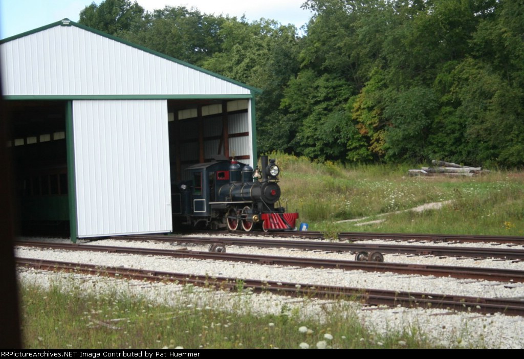 Dinky 2-4-2 pokes it's nose from the shed