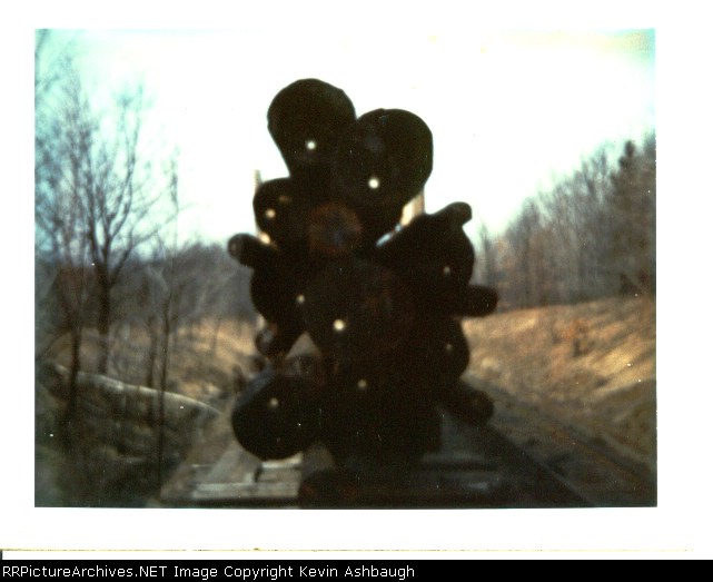 Shame...shame Dad.  You should know better to not climb on a train.