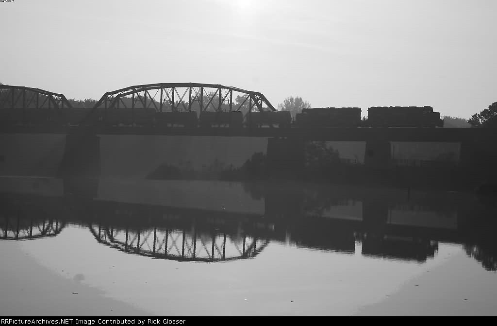 Sihouetted southbound H78 On Lehigh & Hudson Ry bridge Above the Fork @ 0754h