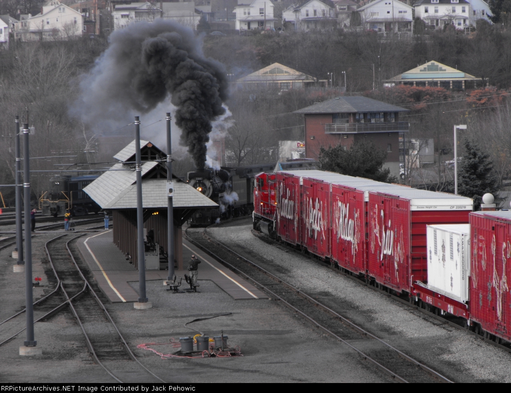 CP #2317 passing CP Holiday Train