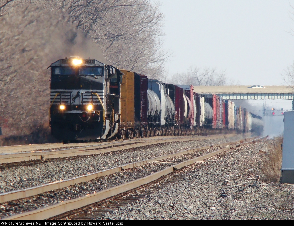 First of 3 quick train on the former Conrail. WB NS9933 heads up a freight at Vickers