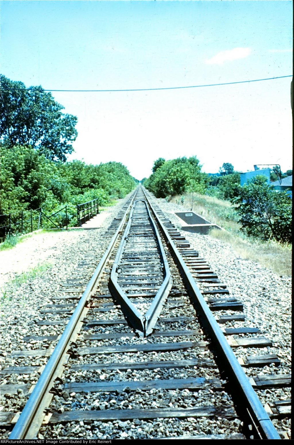 Looking east from depot across the concrete overpass over Main Street.