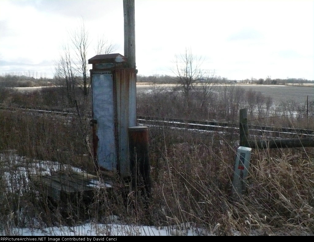 Utility boxes on the east side of the ROW at Wellman Line Rd.
