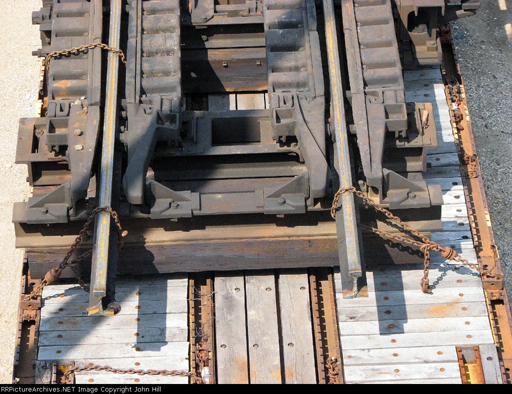 090831042 OTTX 97777 at BNSF Northtown "T" Yard with used hump "Retarder" section