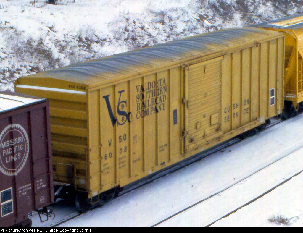 1132-33 Valdosta Southern VSO 6008 on eastbound C&NW freight at BN St. Anthony Jct.