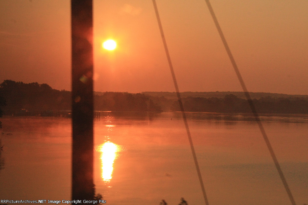 Sunrise between the pole and the guys