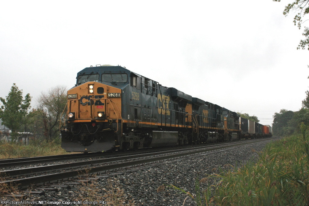 CSX 5268 and train Q031