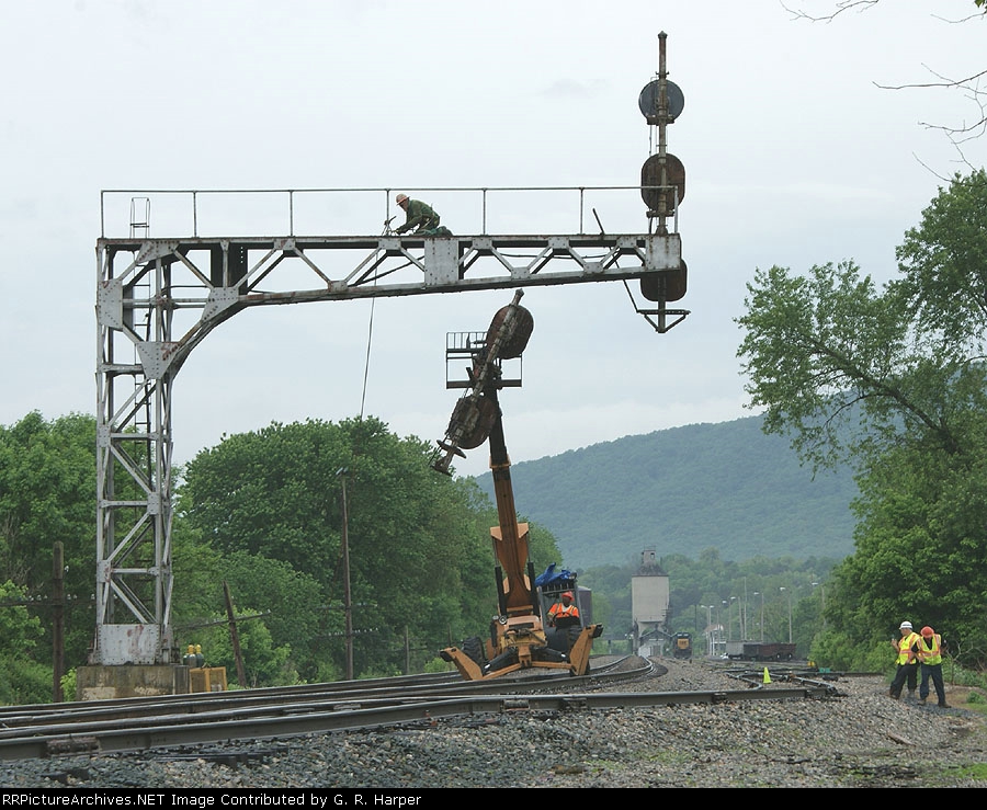 First of two heads comes down