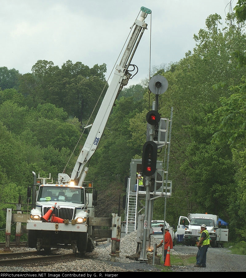 The new signal at Natural Bridge and the old behind it being removed.