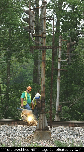 Bond wires are welded where insulated joint once divided a block that no longer exists