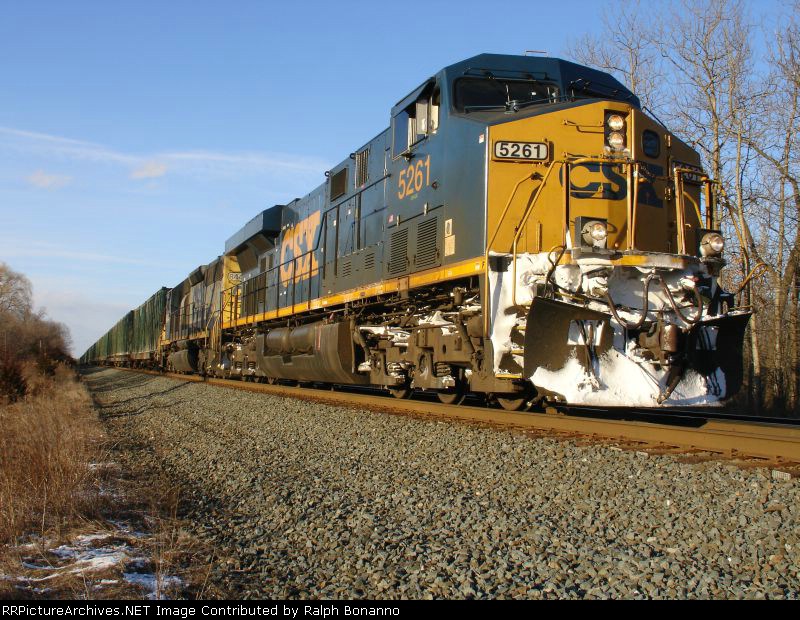 K277-04, with 5261/8444 and 29 cars sits at CP-128 waiting to go south