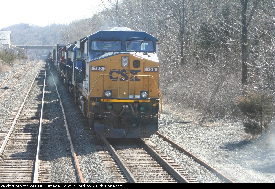 Q410, with a new ES44AC leading, holds the main as we take the siding southbound