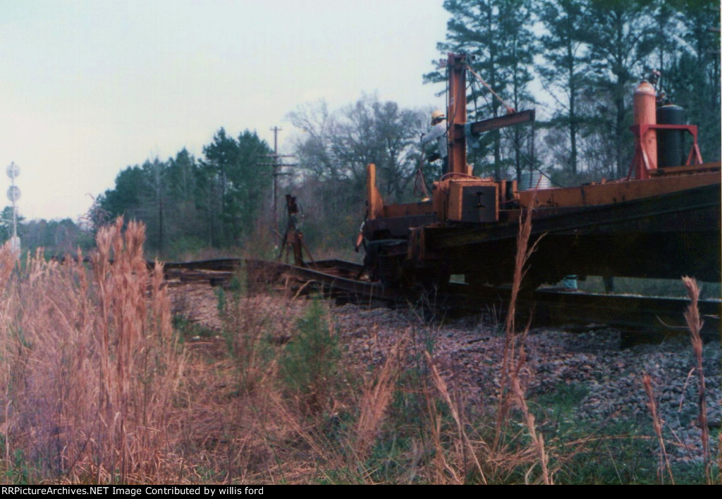Road crew removing rails