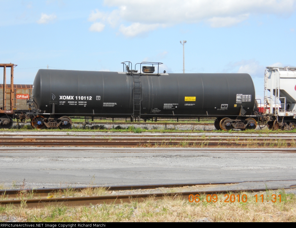 XOMX110112
