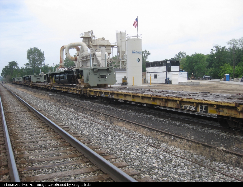 Three GE export platforms headed to Brazil wait on-the NS interchanbe track