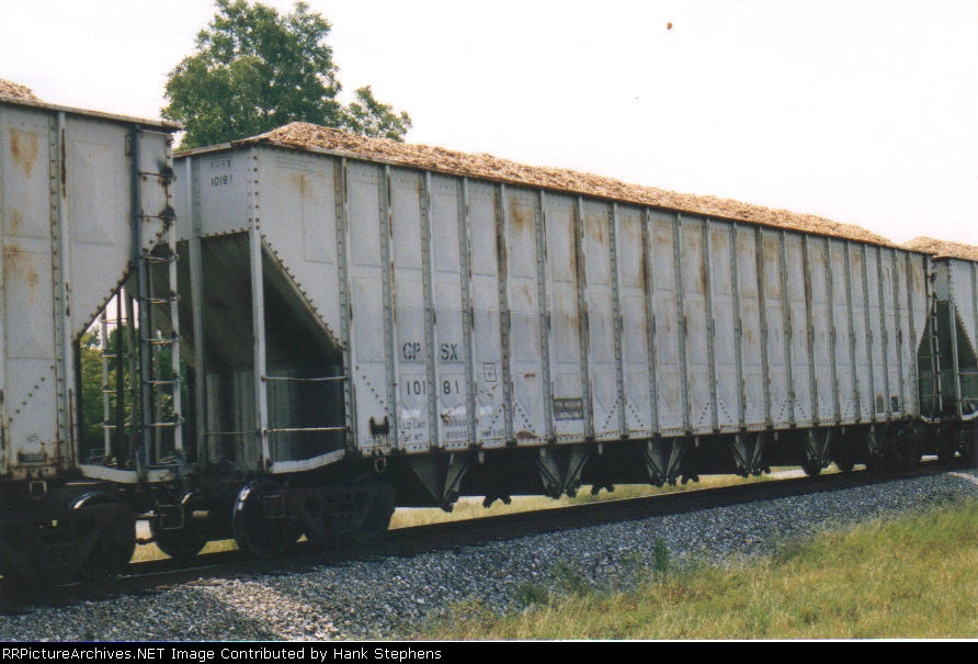 NS ex CofGA Greenville Local pulls a GPSX Greenville type woodchip car from Georgia Pacific.  These cars mixed with Southern and NS painted version on the trains in cuts of over a dozen at the time.