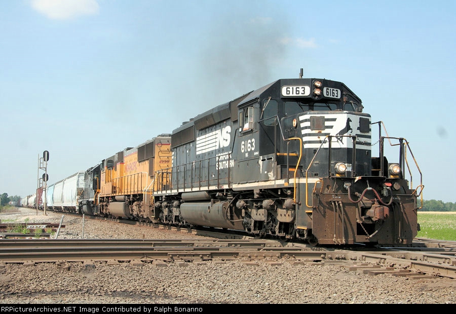 With the lead unit running backwards, NS train 304 crosses the B&O