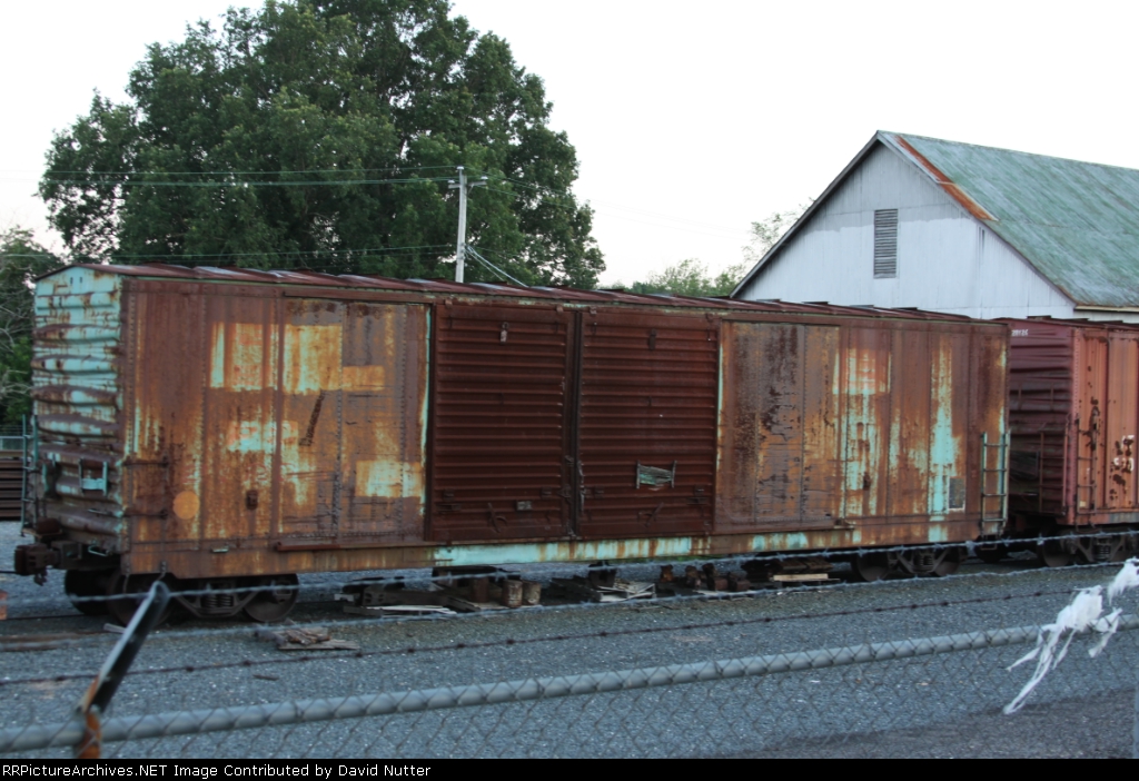 Old ex-Penn Central boxcar with classic bogey there!