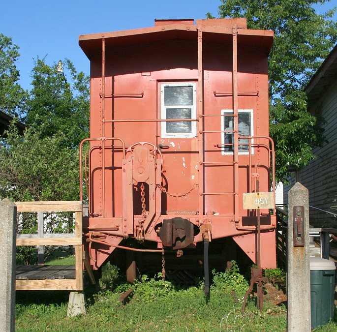 SP Caboose by the depot Unknown number