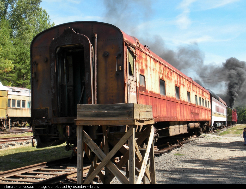 Old Passenger car getting moved around Hallsboro yard waiting to be refurbished