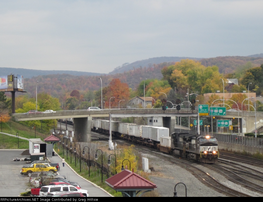 A NS intermodal train heads towards Juniata Shops and Rose Yard