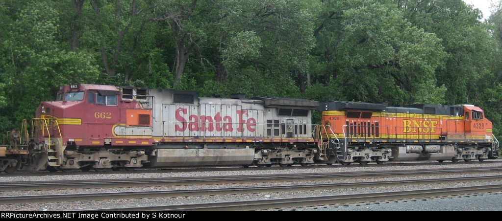 Santa Fe Dash 9 on a stack train passing St Paul Daytons Bluff headed to Chitown in June 2012.