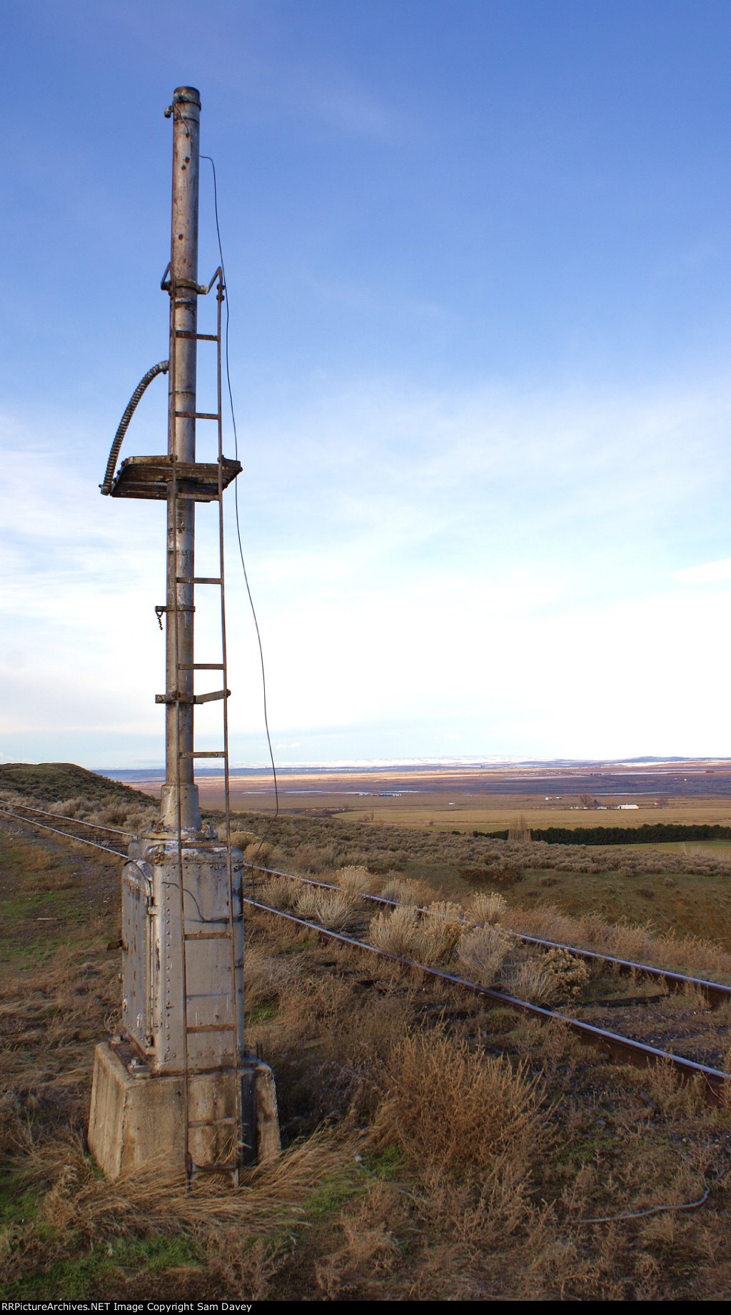 Old signal mast watches over the valley.