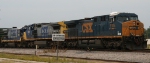 CSX 5105 leads two older GE's into the yard
