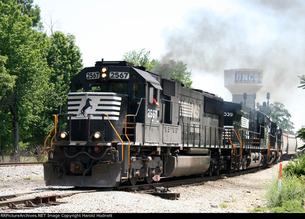 NS 2567 leads a grain train down the yard lead