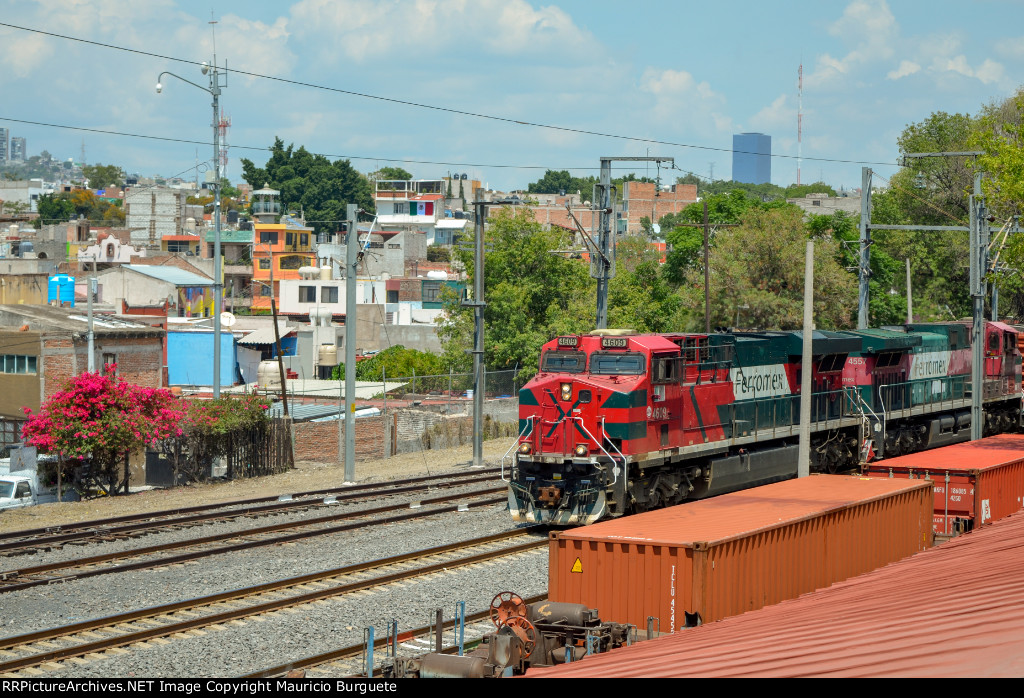 FXE ES44AC Locomotive leading a train