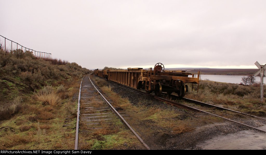 Stored Baretables on the old SP&S Mainline at Martindale Road crossing.