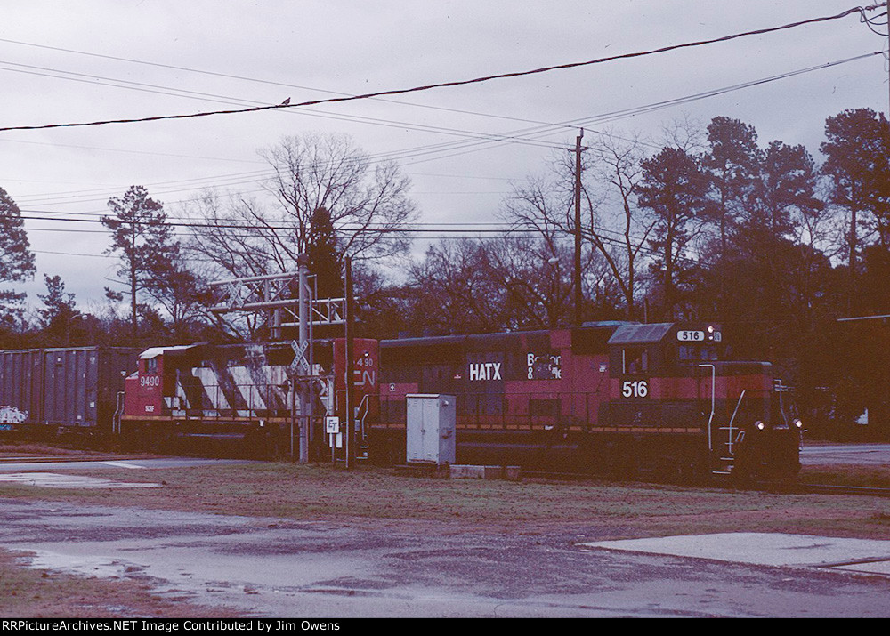 HATX 516 leading a southbound trash train at