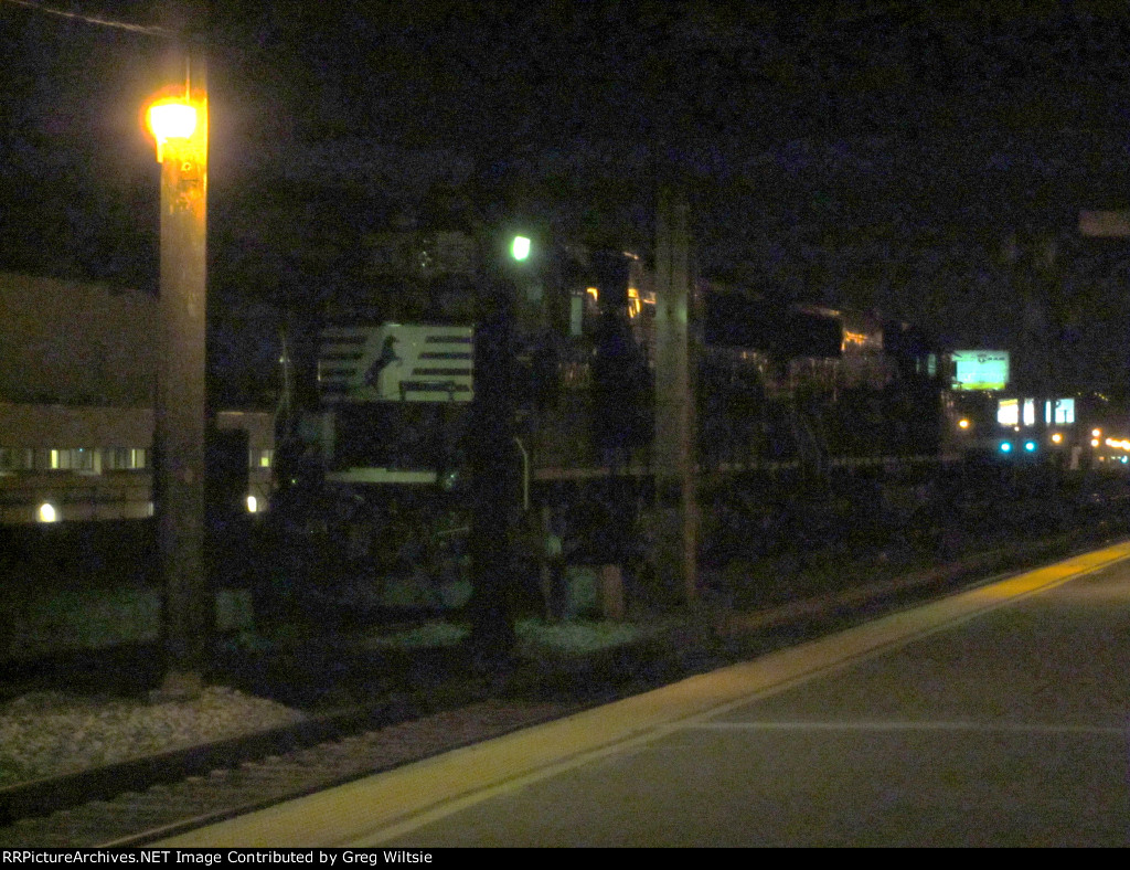A pair of NS locomotives sit at the end of the Pittsburgh Amtrak train shed