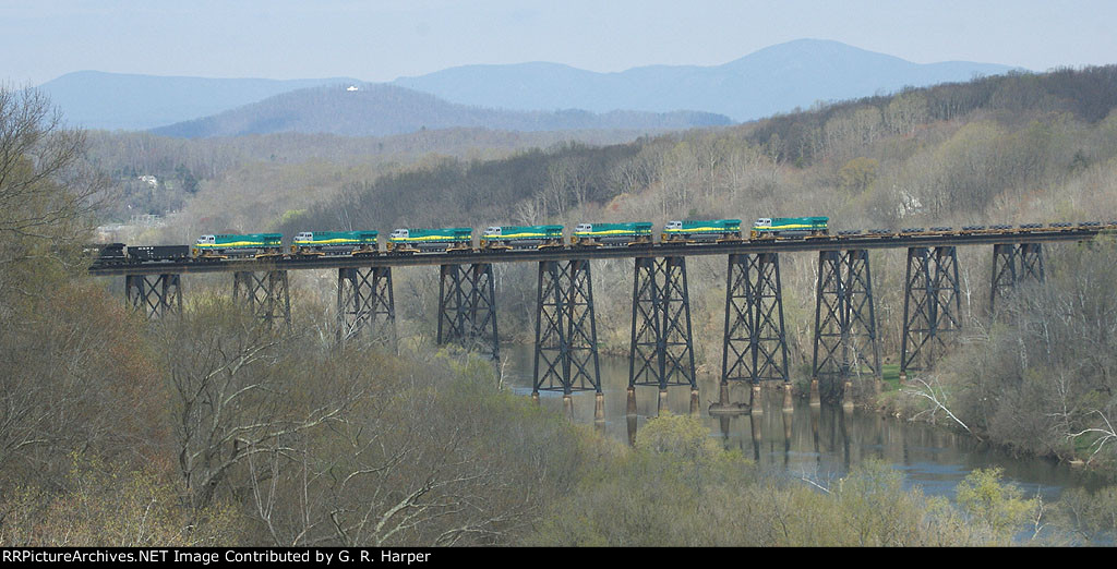 Vale Mining export units and truck assemblies cross the James River