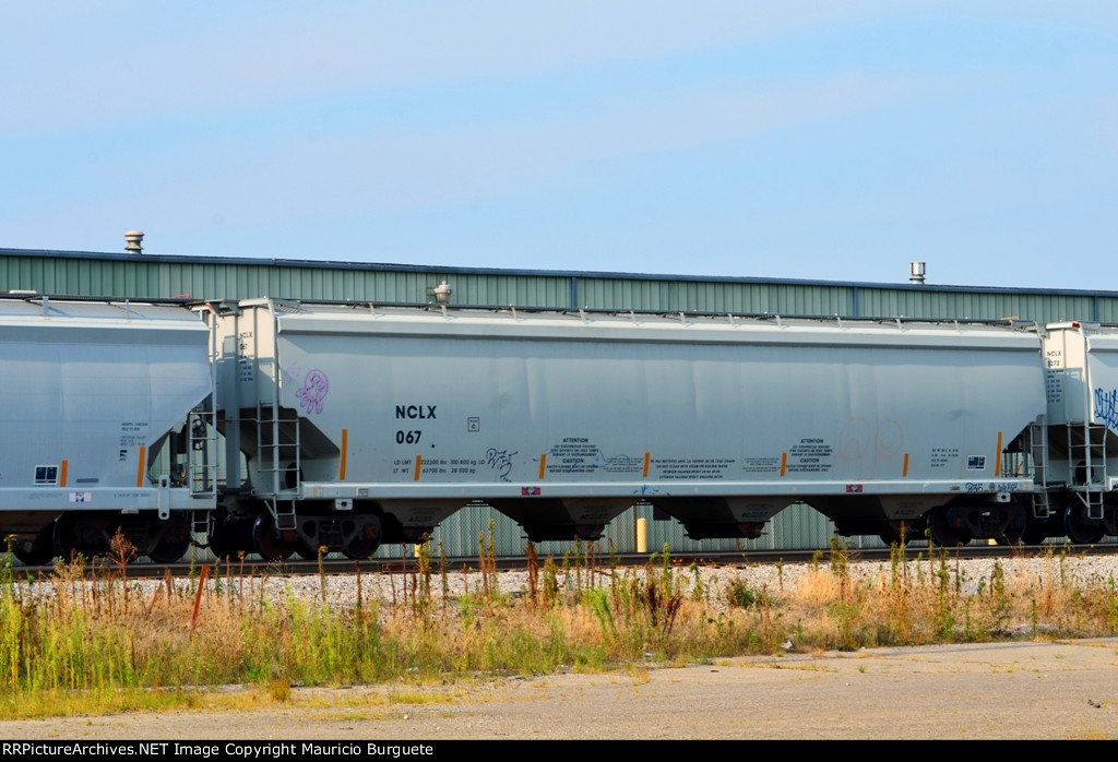 NCLX Covered Hopper with graffiti