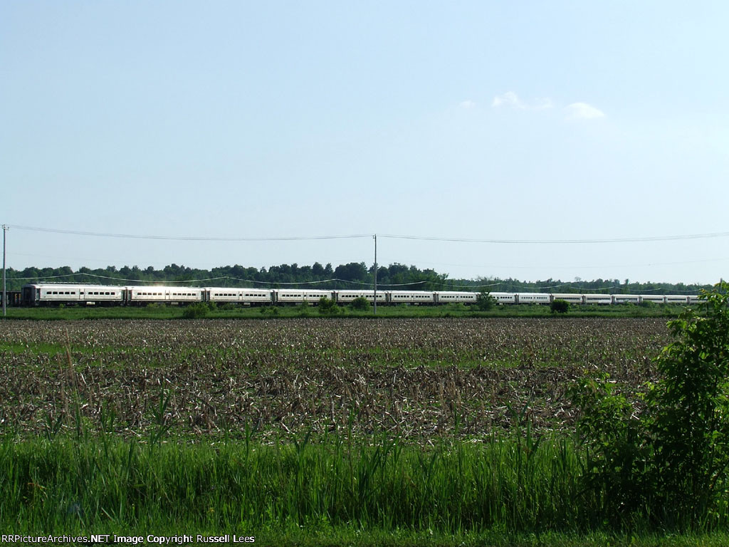 Long line of NJTR passenger cars in the siding at Huntingdon