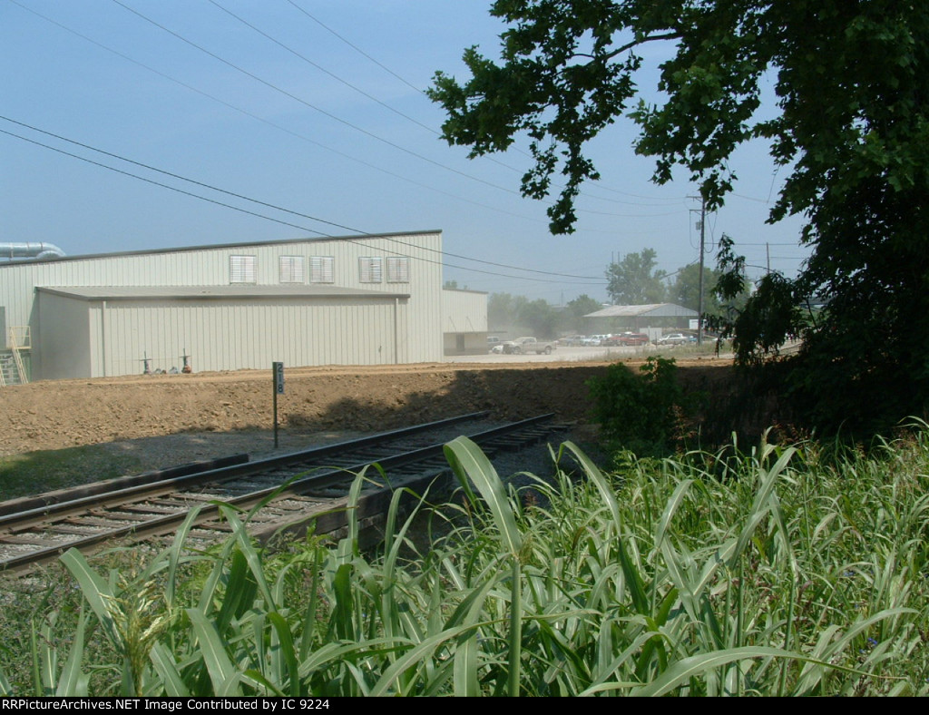 Levee built by Armstrong Corp across tracks at MP 218