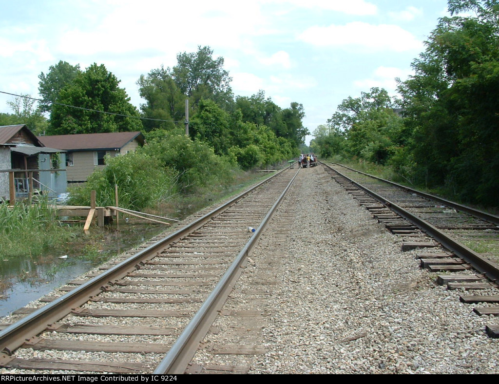 Home owners removing belongings from homes via Cemetery Siding