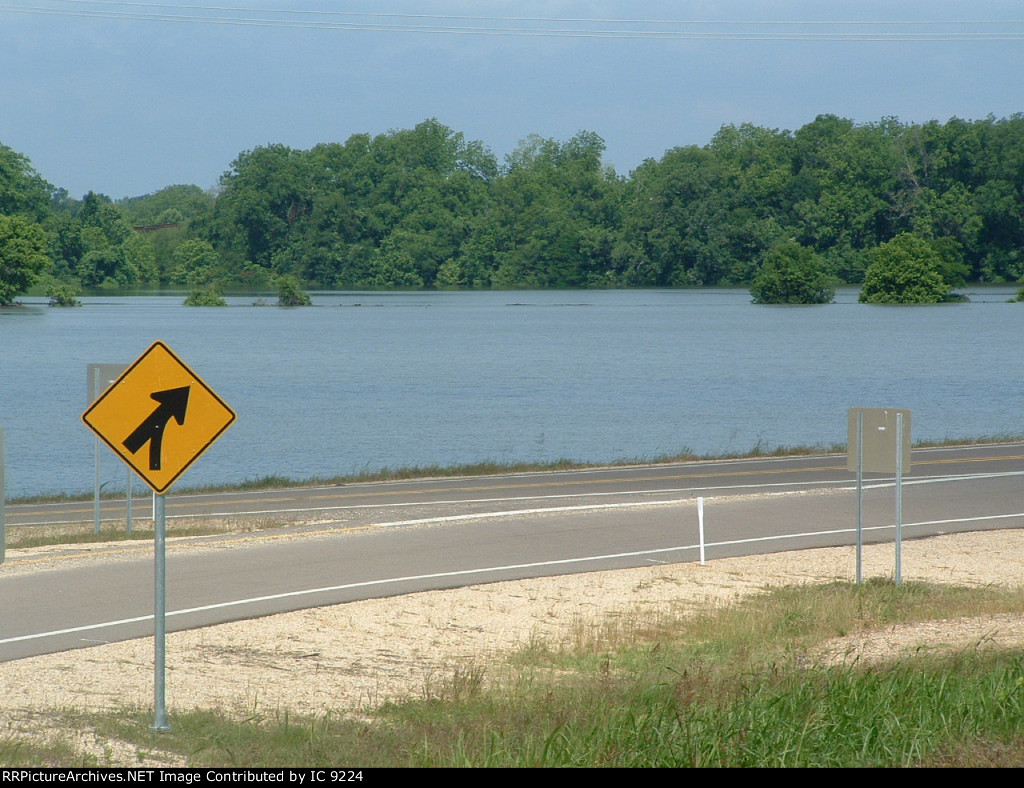 Debris clings to the rails as the water comes over the tracks