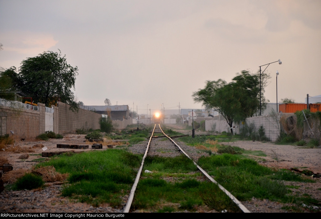 Train picking up loaded Autoracks from the Assembly plant