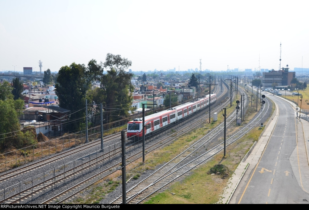 Suburban train passing by Valle de Mexico Terminal