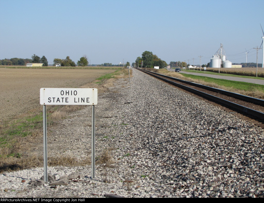 Flat and straight, the Fostoria District heads east off into Ohio