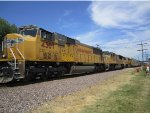 UP 4307 leads 5056 and 4054 with a manifest