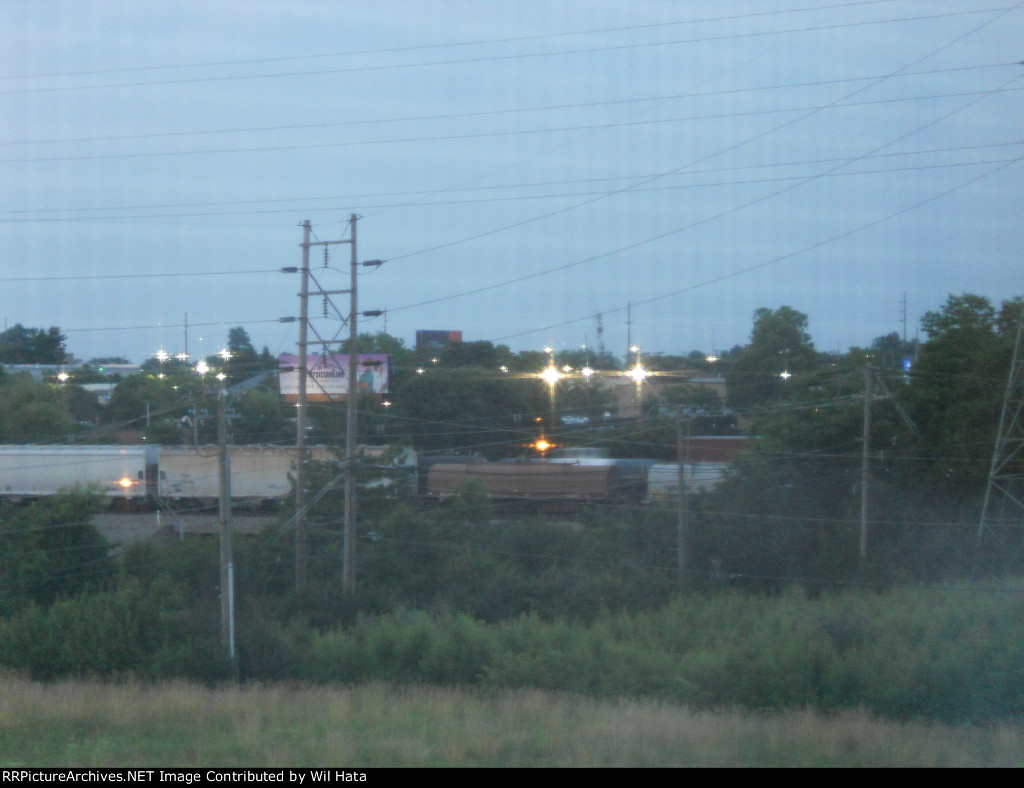 NS Freight Passing Another
