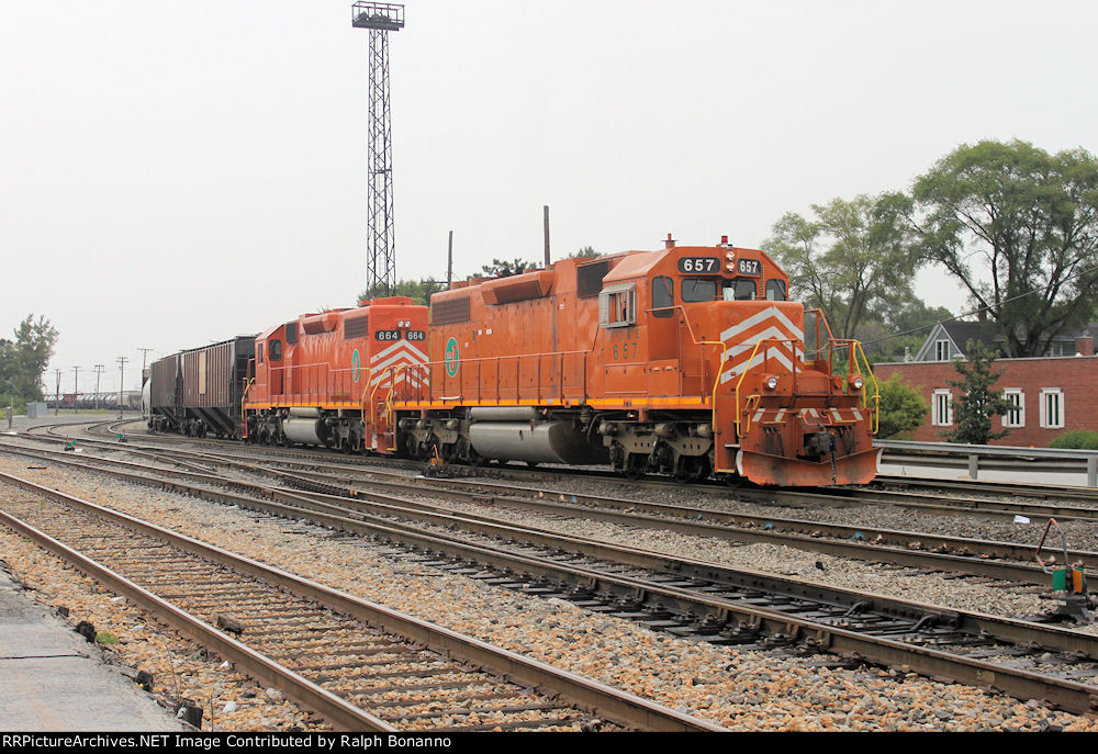 A pair of EJ&E SD40-2's drilling out cars at the south end of the CN yard stand out on a cloudy afternoon