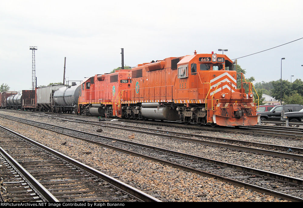 The CN uses former EJ&E power to drill cars out at the south end of the yard